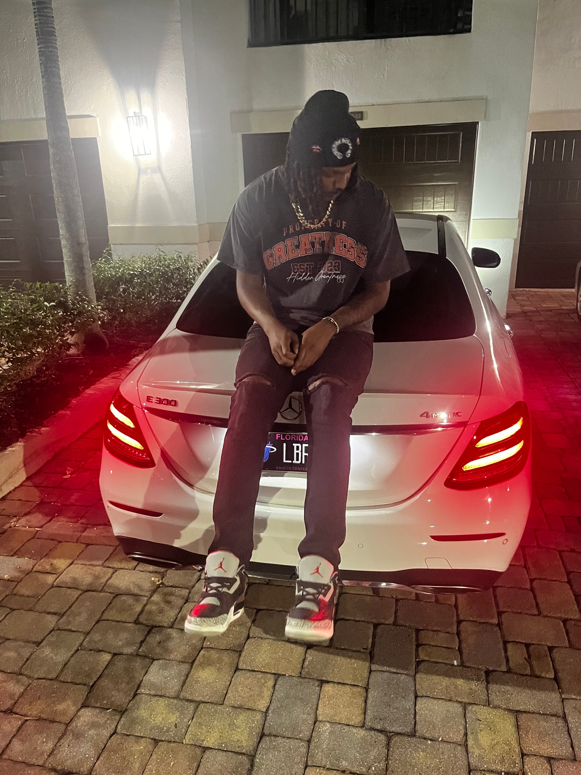 PROPERTY OF GREATNESS TEE